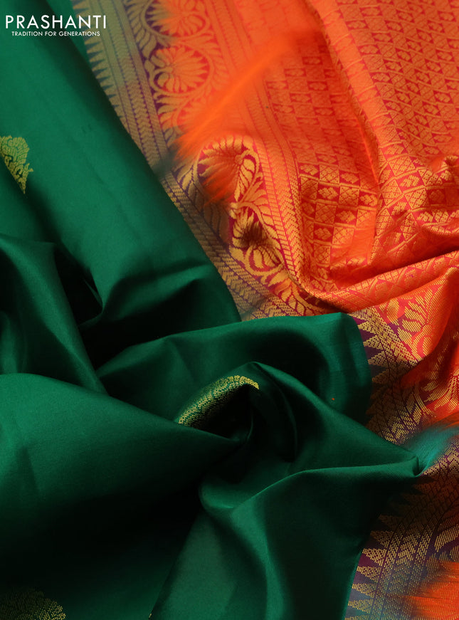 Pure kanchipuram silk saree green and dual shade of pinkish orange with zari woven buttas and zari woven border