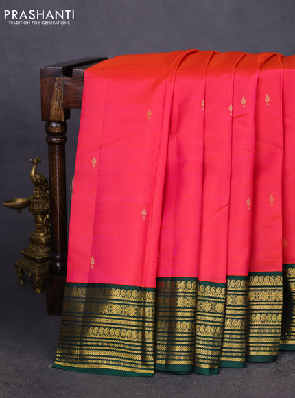 Pure kanchipuram silk saree dual shade of pinkish orange and green with zari woven buttas and zari woven korvai border