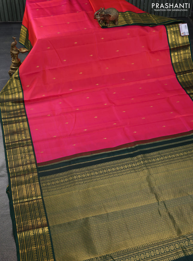 Pure kanchipuram silk saree dual shade of pinkish orange and green with zari woven buttas and zari woven korvai border