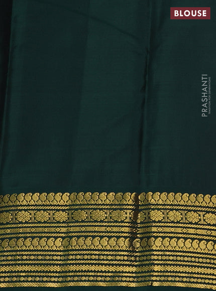 Pure kanchipuram silk saree dual shade of pinkish orange and green with zari woven buttas and zari woven korvai border