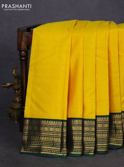 Pure kanchipuram silk saree yellow and green with zari woven buttas and zari woven korvai border