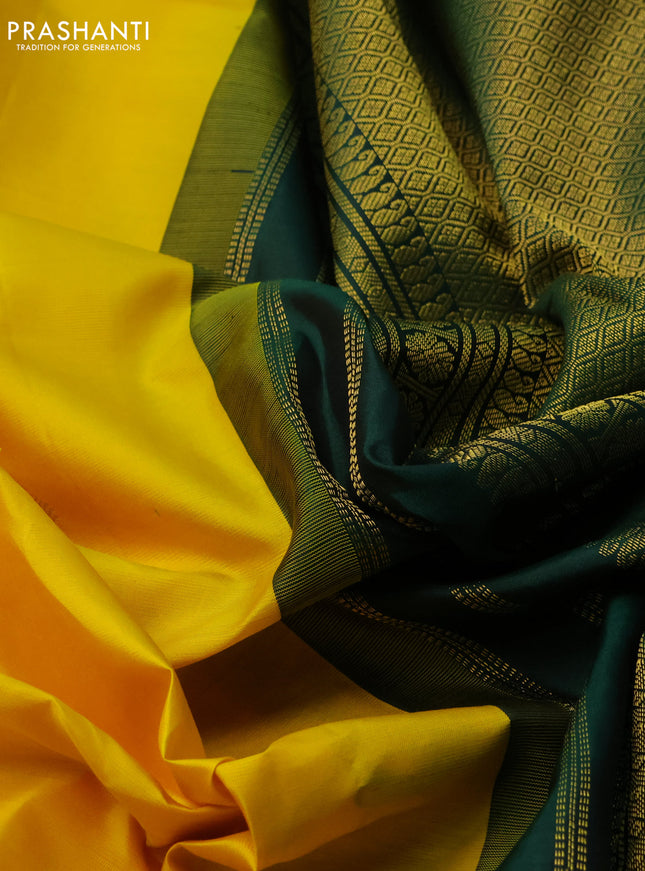 Pure kanchipuram silk saree yellow and green with zari woven buttas and zari woven korvai border
