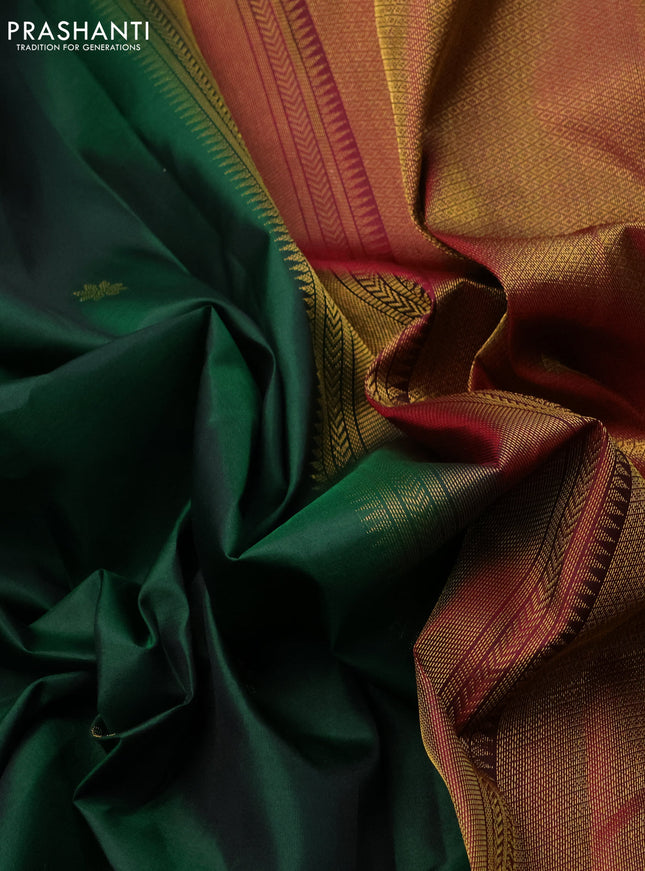 Pure kanchipuram silk saree dark green and dark magenta pink with zari woven floral buttas and zari woven border