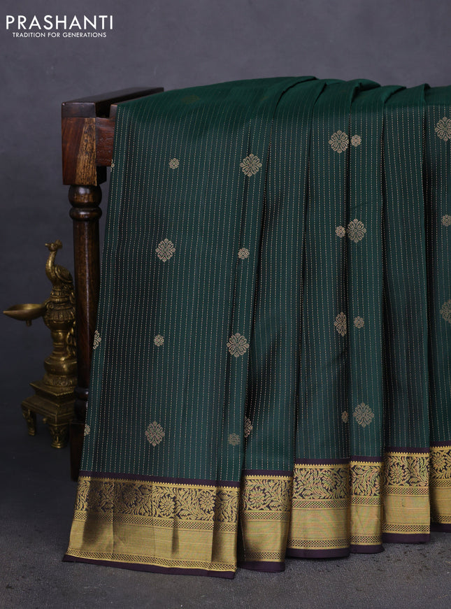 Pure kanchipuram silk saree bottle green and deep wine shade with allover zari weaves & buttas and zari wove border