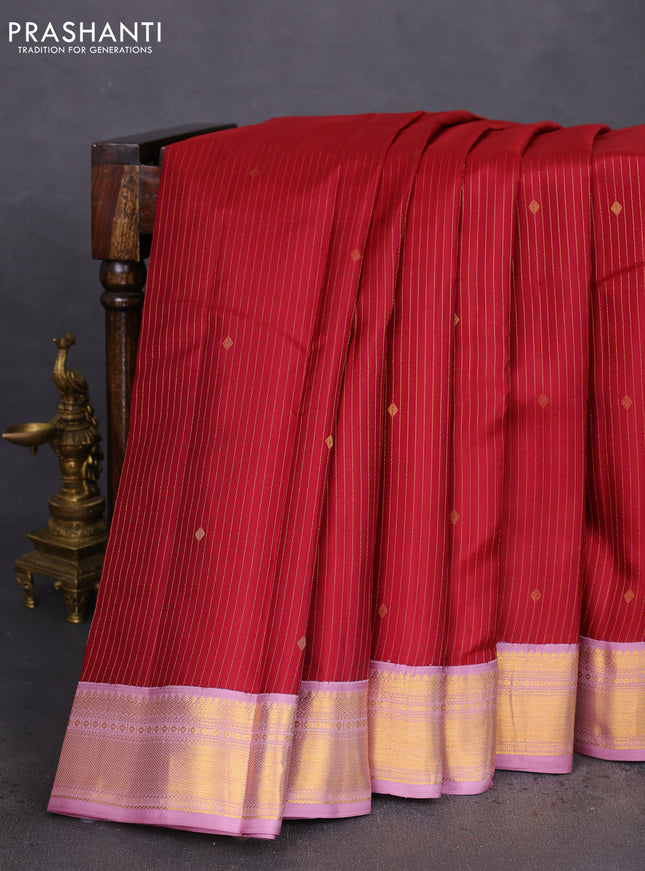 Pure kanchipuram silk saree maroon and mauve pink with allover zari stripes & zari buttas and zari woven korvai border