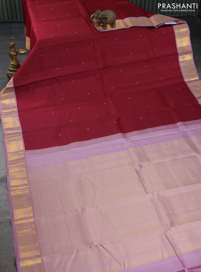 Pure kanchipuram silk saree maroon and mauve pink with allover zari stripes & zari buttas and zari woven korvai border