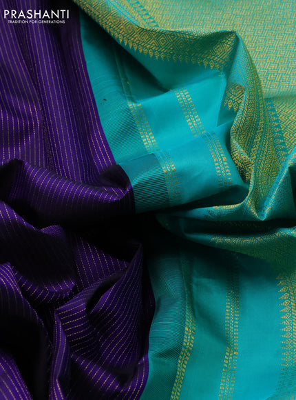 Pure kanchipuram silk saree blue and teal blue with allover zari stripes pattern and zari woven korvai border