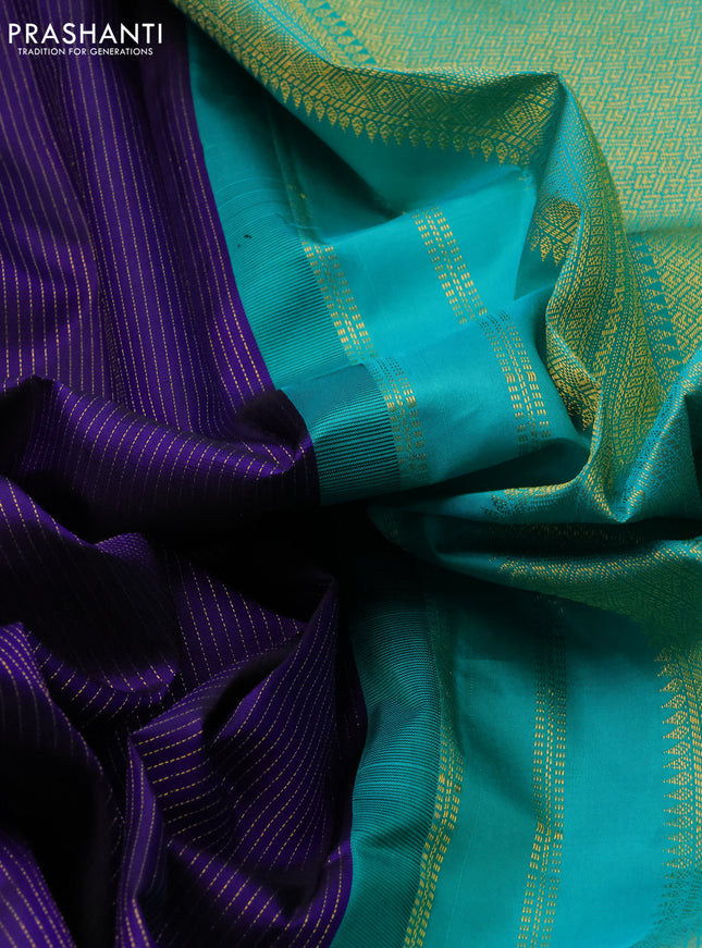Pure kanchipuram silk saree blue and teal blue with allover zari stripes pattern and zari woven korvai border
