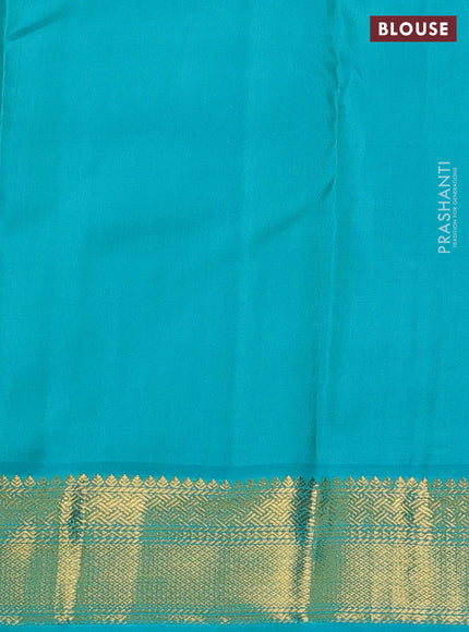 Pure kanchipuram silk saree blue and teal blue with allover zari stripes pattern and zari woven korvai border