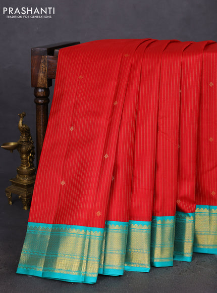 Pure kanchipuram silk saree red and teal blue with allover zari stripes & zari buttas and zari woven korvai border