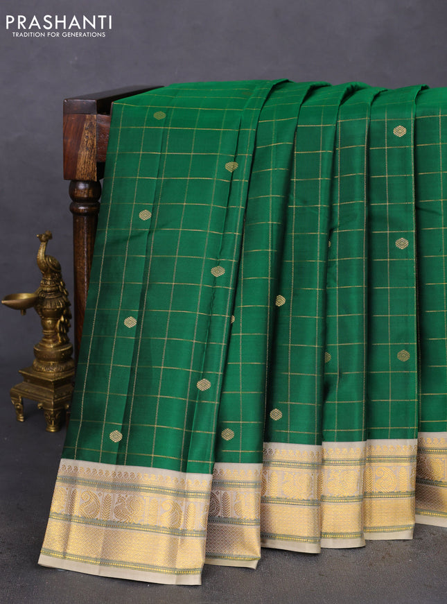 Pure kanchipuram silk saree green and beige with allover zari checks & buttas and annam zari woven korvai border