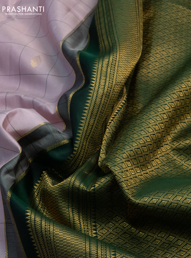 Pure kanchipuram silk saree pastel pink and green with allover checked pattern & zari buttas and zari woven korvai border
