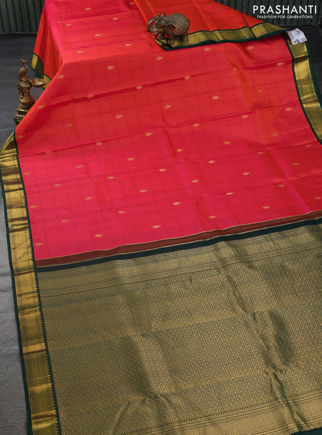 Pure kanchipuram silk saree dual shade of pinkish orange and green with allover checked pattern & zari buttas and zari woven korvai border