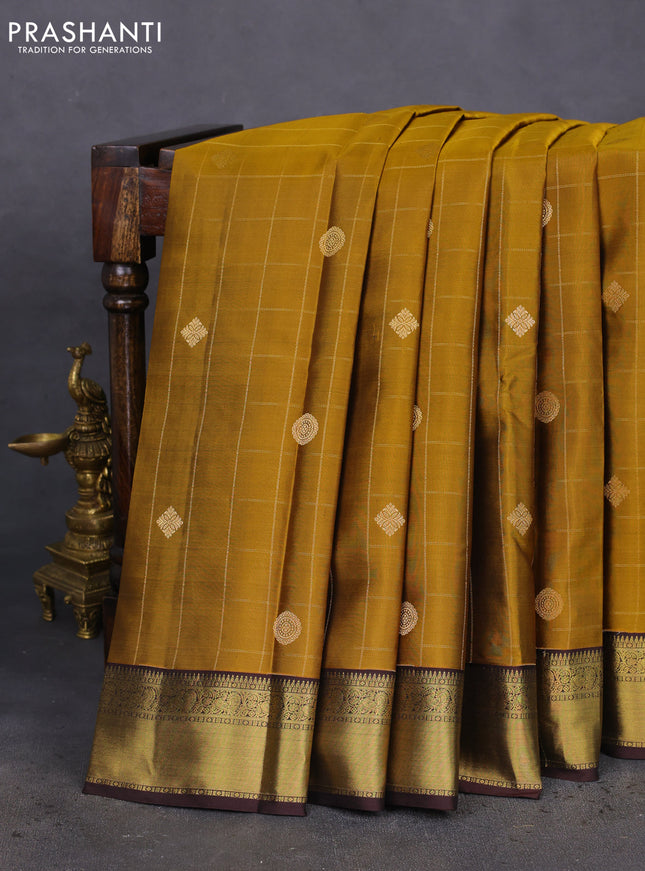 Pure kanchipuram silk saree mustard yellow and brown with allover zari checks & buttas and annam zari woven korvai border