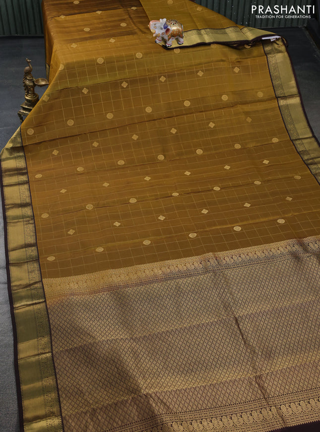 Pure kanchipuram silk saree mustard yellow and brown with allover zari checks & buttas and annam zari woven korvai border