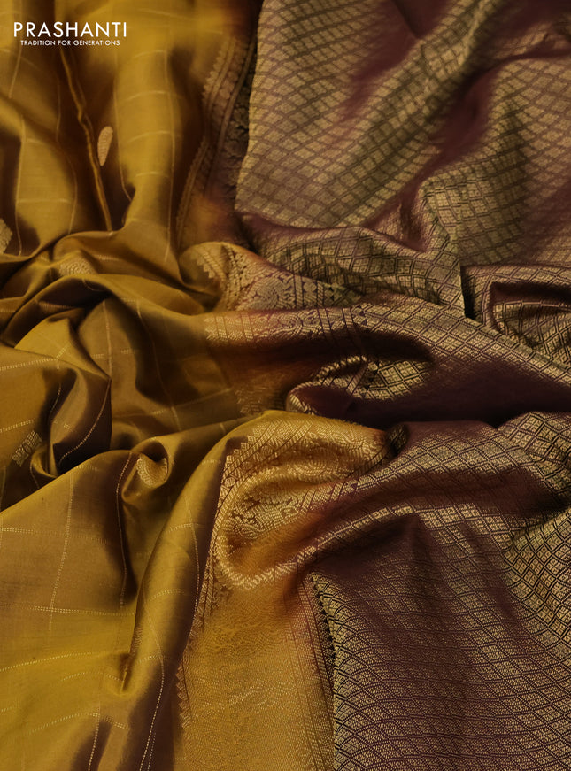 Pure kanchipuram silk saree mustard yellow and brown with allover zari checks & buttas and annam zari woven korvai border
