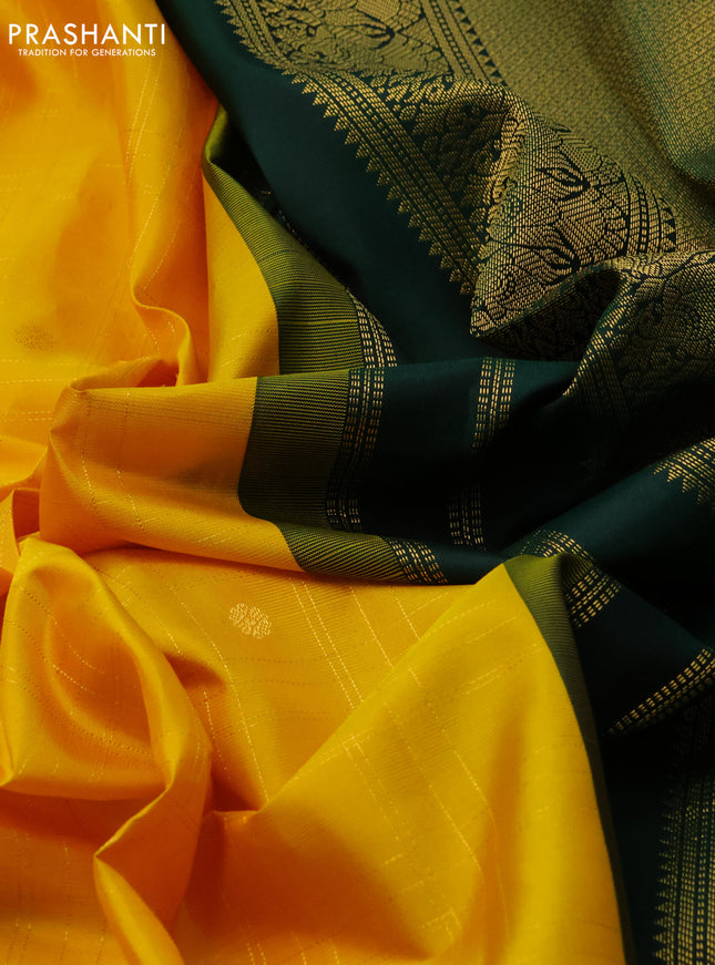 Pure kanchipuram silk saree yellow and green with allover zari checks & buttas and annam zari woven korvai border