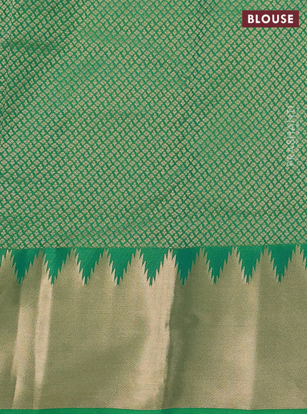 Pure kanchipuram silk saree cream with plain body and temple design zari woven border