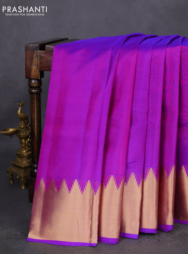 Pure kanchipuram silk saree purple with plain body and temple design zari woven border