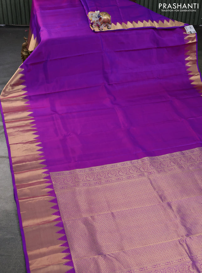 Pure kanchipuram silk saree purple with plain body and temple design zari woven border