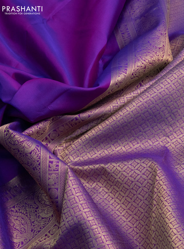 Pure kanchipuram silk saree purple with plain body and temple design zari woven border