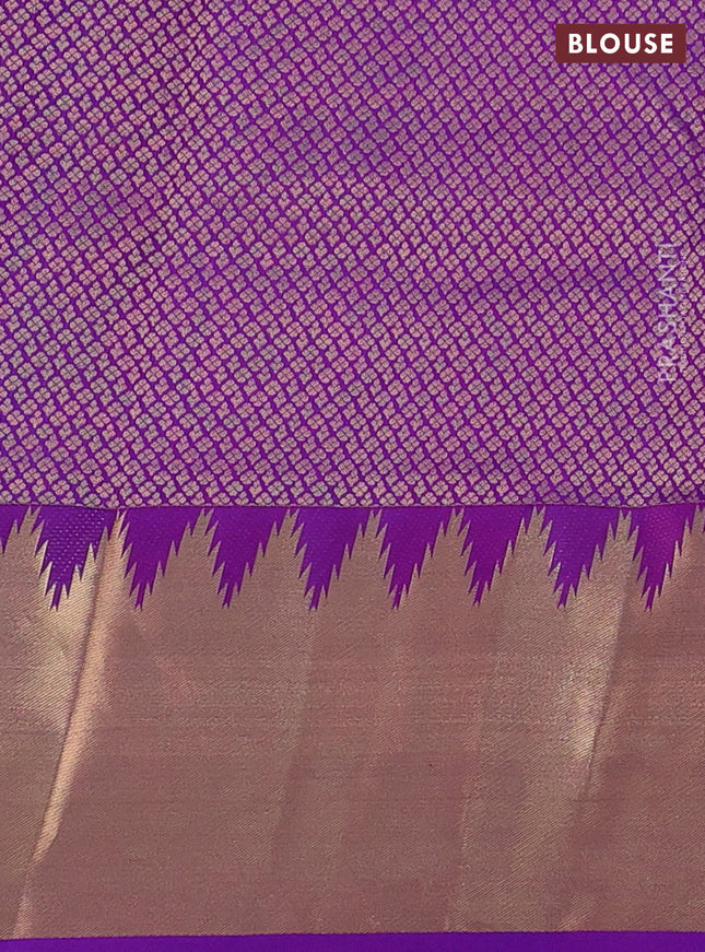 Pure kanchipuram silk saree purple with plain body and temple design zari woven border