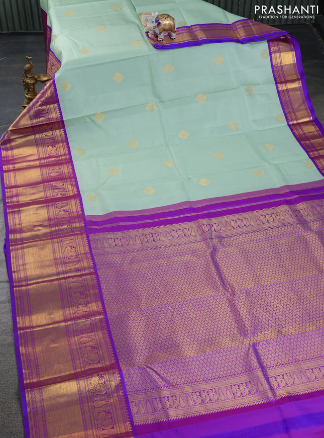 Pure kanchipuram silk saree pastel green and dual shade of purple with zari woven buttas and long zari woven korvai border