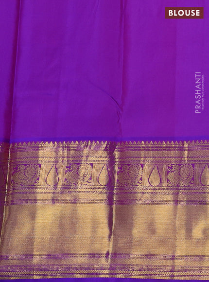 Pure kanchipuram silk saree pastel green and dual shade of purple with zari woven buttas and long zari woven korvai border