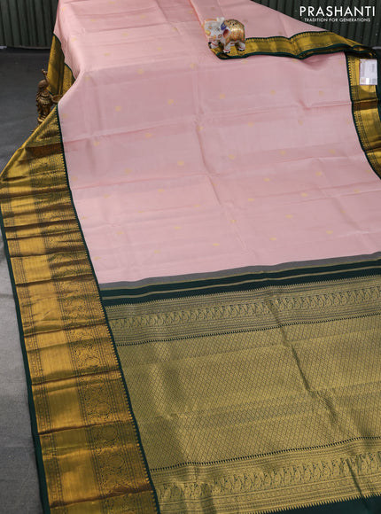 Pure kanchipuram silk saree pastel peach and dark green with zari woven buttas and long zari woven korvai border