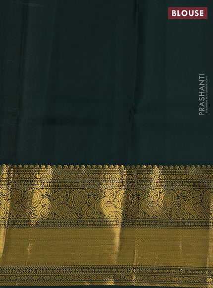 Pure kanchipuram silk saree pastel peach and dark green with zari woven buttas and long zari woven korvai border