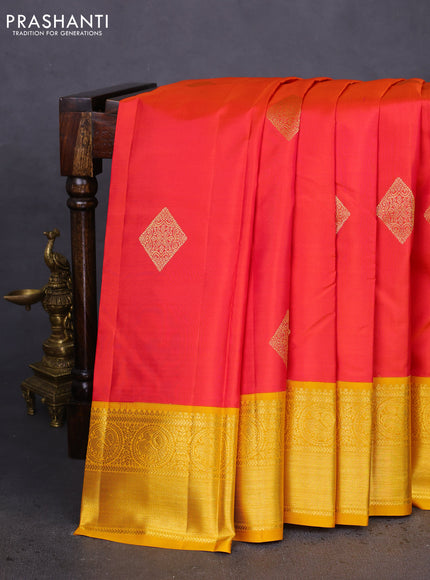 Pure kanchipuram silk saree dual shade of pinkish orange and mustard yellow with zari woven buttas and zari woven korvai border