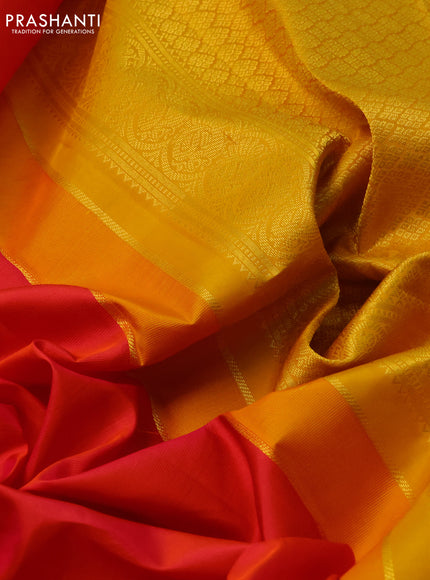 Pure kanchipuram silk saree dual shade of pinkish orange and mustard yellow with zari woven buttas and zari woven korvai border