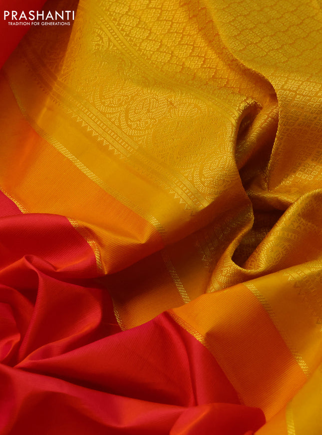 Pure kanchipuram silk saree dual shade of pinkish orange and mustard yellow with zari woven buttas and zari woven korvai border