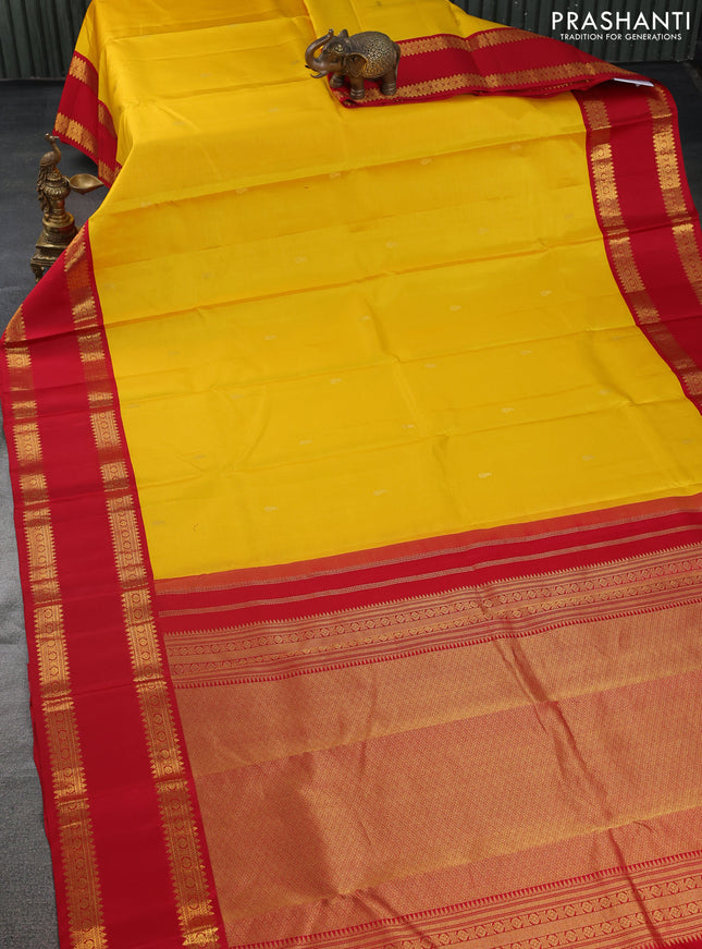 Pure kanchipuram silk saree yellow and red with allover vairaosi pattern & zari buttas and rettapet zari woven korvai border