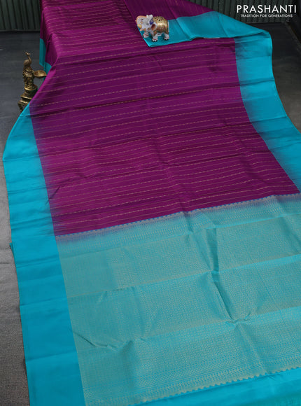 Pure kanchipuram silk saree purple and teal blue with allover stripes pattern and simple border
