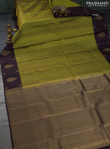 Pure kanchipuram silk saree mehendi green and wine shade with allover stripes pattern and zari woven butta border