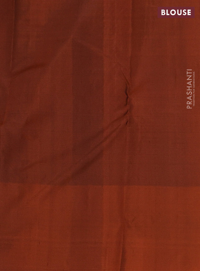 Pure kanchipuram silk saree bottle green and orange with allover stripes pattern and zari woven butta border