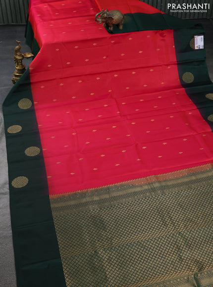 Pure kanchipuram silk saree dual shade of pinkish orange and dark green with zari woven buttas and zari woven butta border