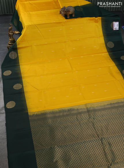 Pure kanchipuram silk saree yellow and dark green with zari woven buttas and zari woven butta border