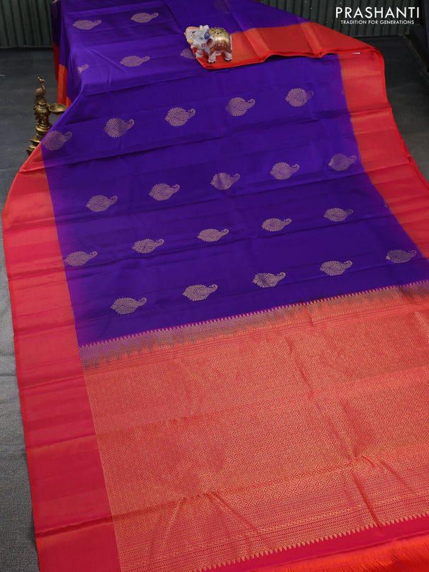 Pure kanchipuram silk saree blue and dual shade of pinkish orange with zari woven buttas and zari woven border
