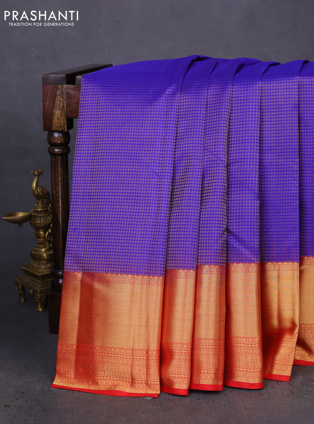 Pure kanchipuram silk saree blue and red with allover small zari checked pattern and long zari woven border