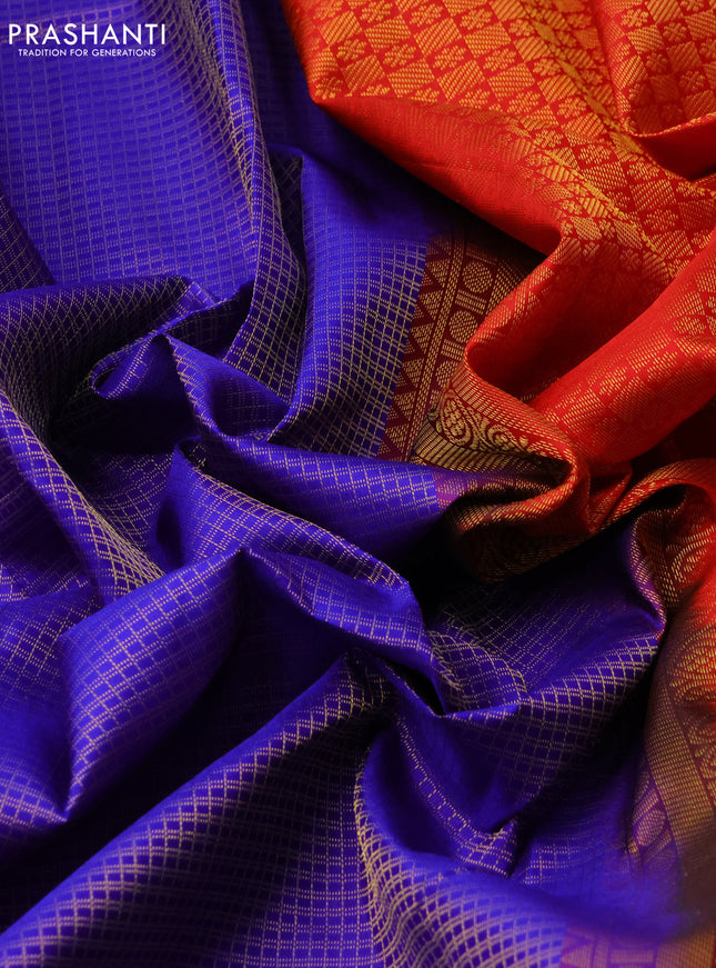 Pure kanchipuram silk saree blue and red with allover small zari checked pattern and long zari woven border