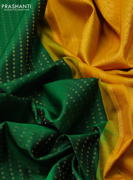 Pure kanchipuram silk saree green and mustard yellow with allover zari woven butta weaves and long zari woven korvai border