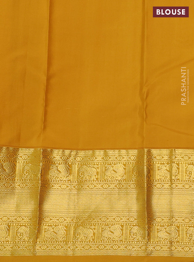 Pure kanchipuram silk saree green and mustard yellow with allover zari woven butta weaves and long zari woven korvai border