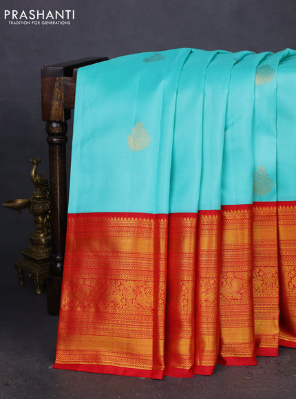 Pure kanchipuram silk saree teal blue and red with zari woven buttas and long zari woven korvai border