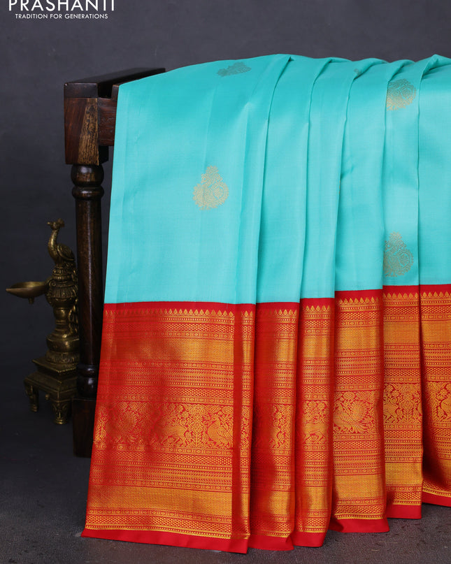 Pure kanchipuram silk saree teal blue and red with zari woven buttas and long zari woven korvai border