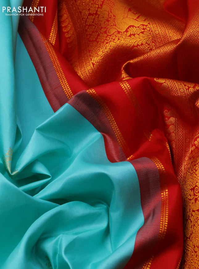 Pure kanchipuram silk saree teal blue and red with zari woven buttas and long zari woven korvai border