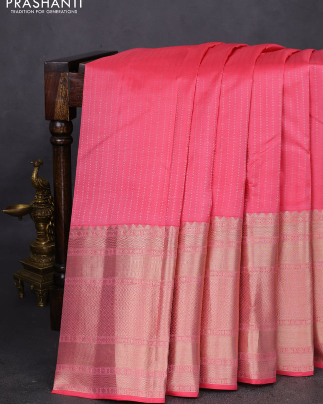 Pure kanchipuram silk saree peach pink with allover zari woven butta weaves and long zari woven korvai border