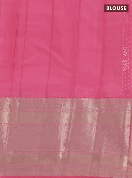 Pure kanchipuram silk saree peach pink with allover zari woven butta weaves and long zari woven korvai border