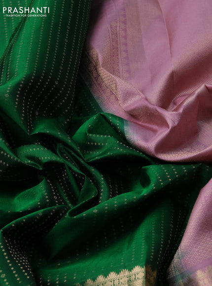 Pure kanchipuram silk saree green and mauve pink with allover zari woven butta weaves and long zari woven korvai border
